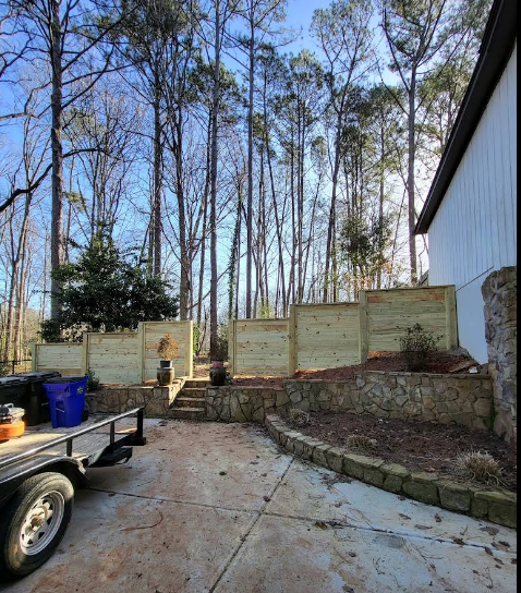 Long cedar privacy fence install